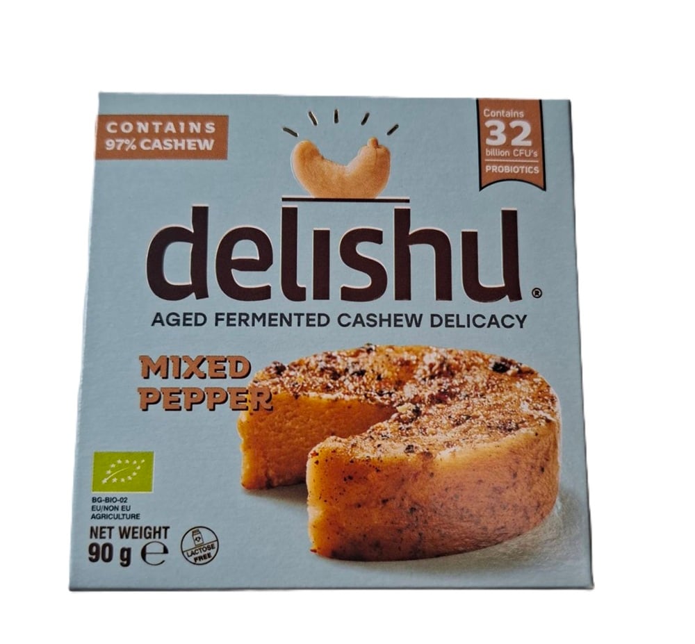 Delishu Fermentált, kesudió alapú érlelt sajt jellegű készítmény színes borssal